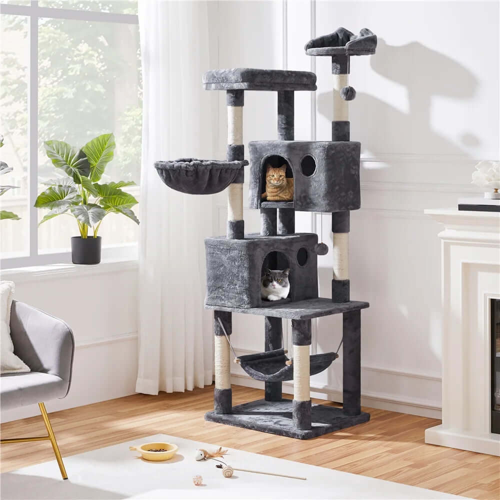 73"H Multi-Level Cat Tree Tower with Condos and Perches, Dark Gray in a stylish living room setting.